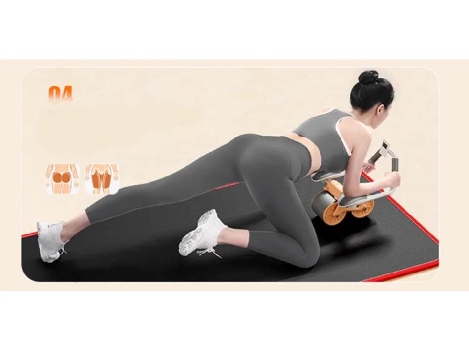 A woman demonstrating a fourth exercise variation using the abdominal wheel.