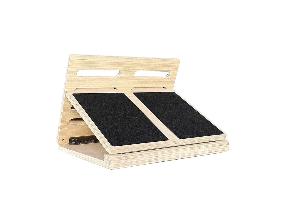 A clean, isolated view of the wooden slant board.
