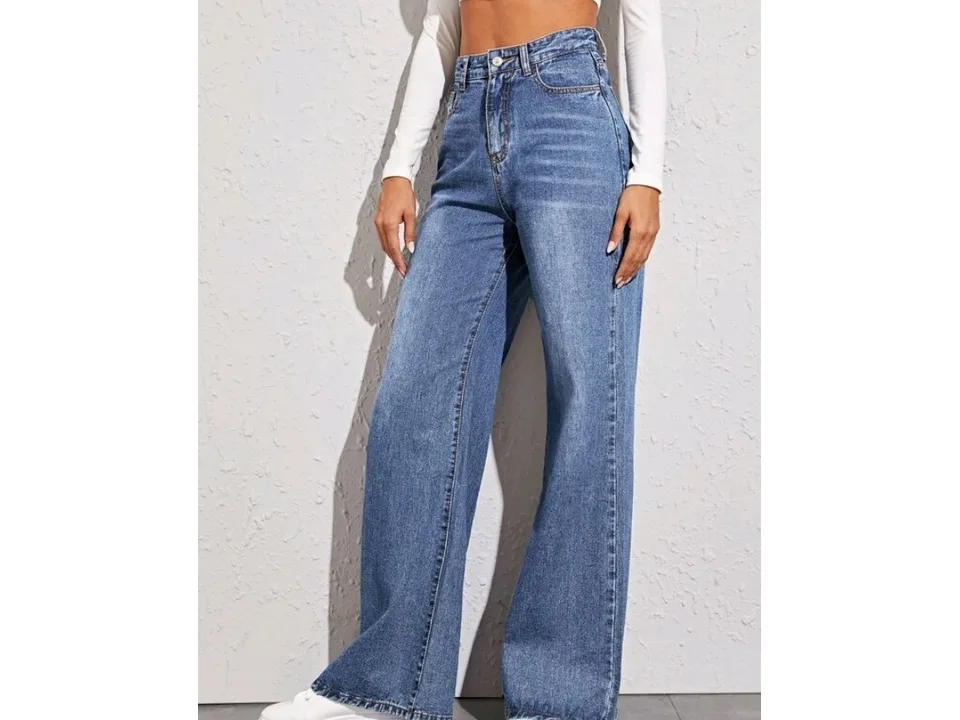 Front view of high-waisted wide-leg blue denim jeans on a model.