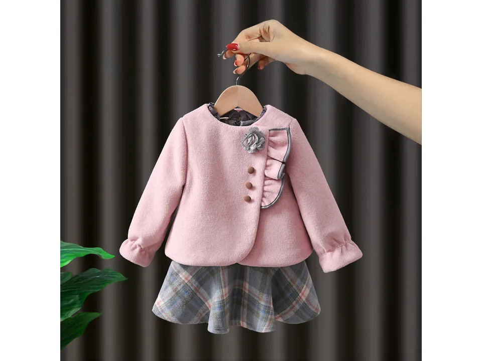 Pink girls' jacket and dress set on a hanger