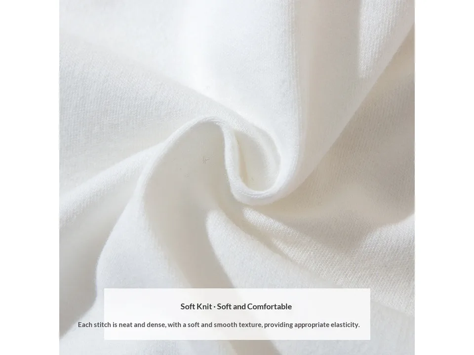 Close-up of the soft white cotton fabric texture.