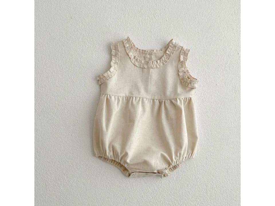 A beige sleeveless baby romper with ruffled neckline.