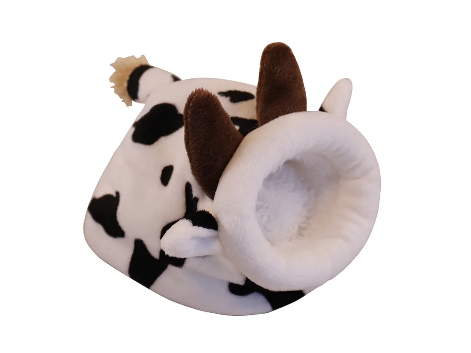 Cow-themed plush small animal bed house