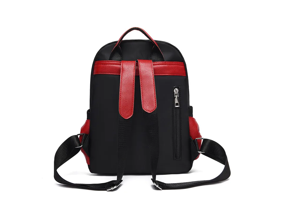 Back view of the backpack showing straps and back zipper pocket