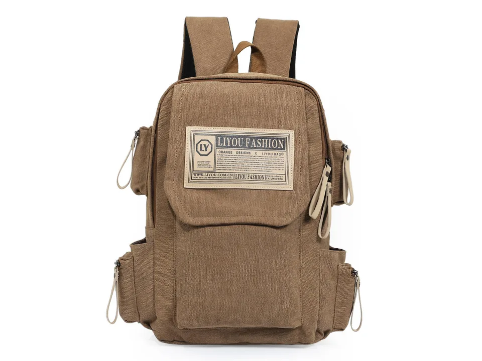 A brown canvas backpack with multiple pockets and a branded patch on the front.