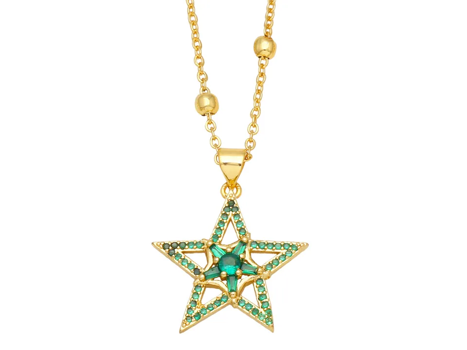 Gold necklace with a star-shaped pendant featuring green stones.