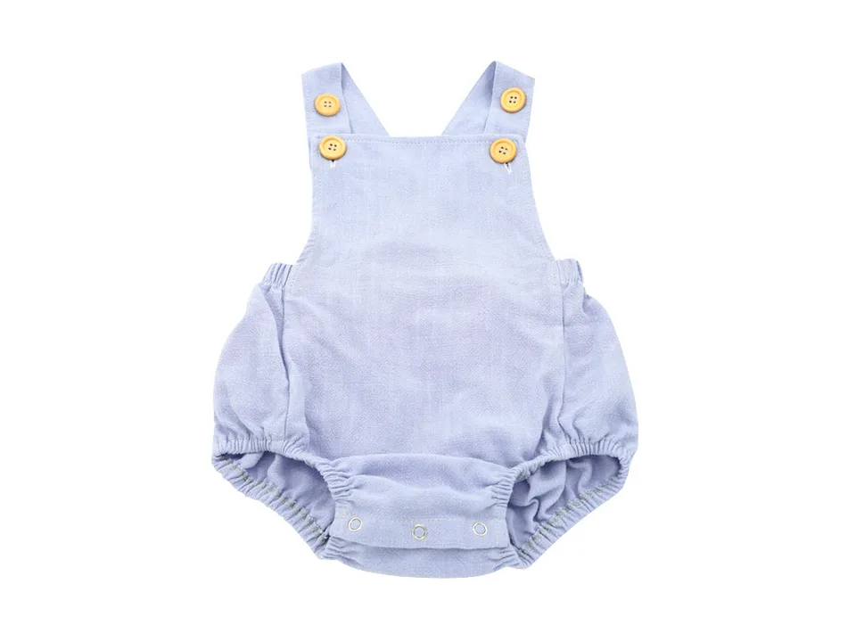 A single purple baby linen suspender romper on a white background.