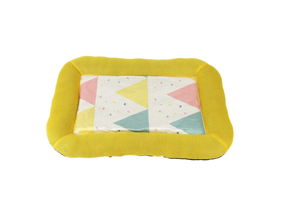 Yellow pet cooling mat with a geometric triangle pattern.