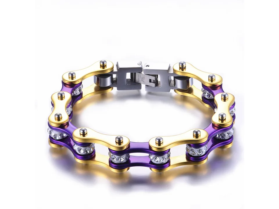 Purple and gold bicycle chain link bracelet with cubic zirconia stones.