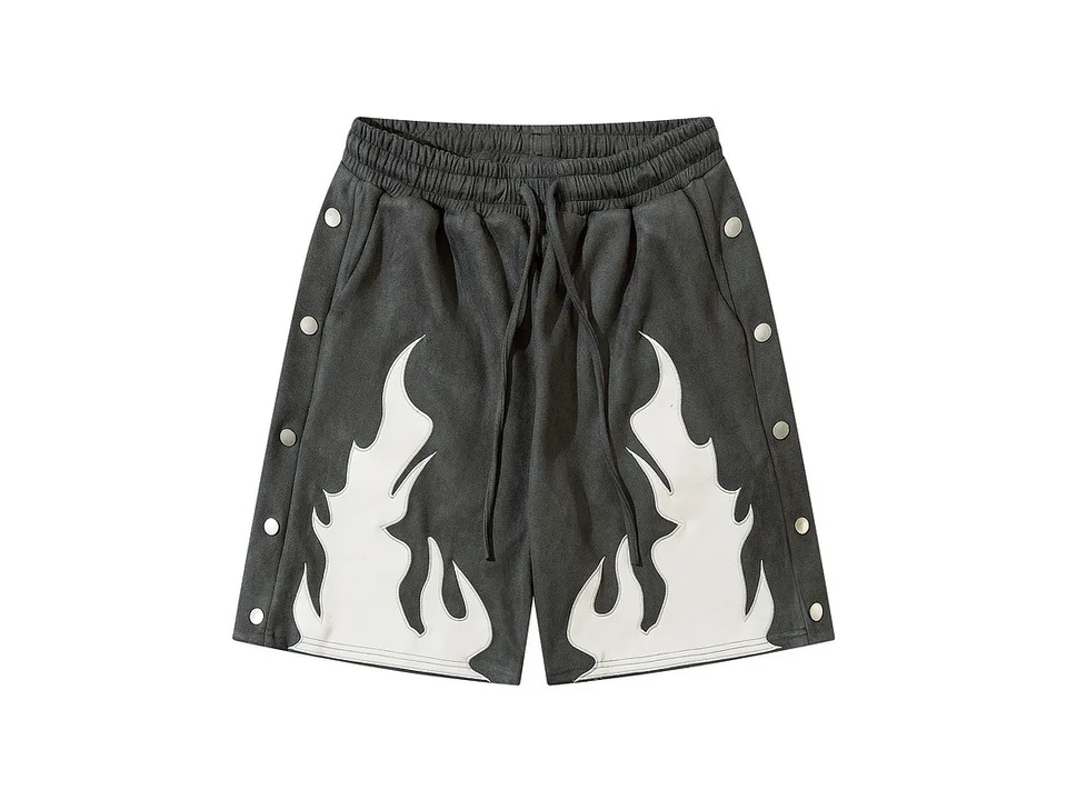 Grey sweatshorts with white flame print and side snap buttons.