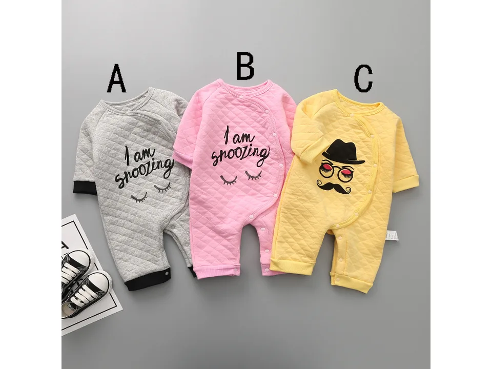 Three baby rompers in grey, pink, and yellow with different designs labeled A, B, and C.