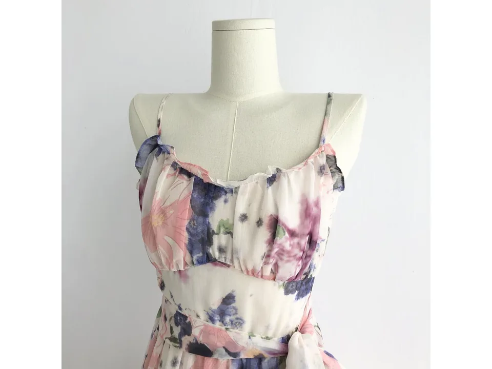 Close-up of the floral dress bodice and spaghetti straps