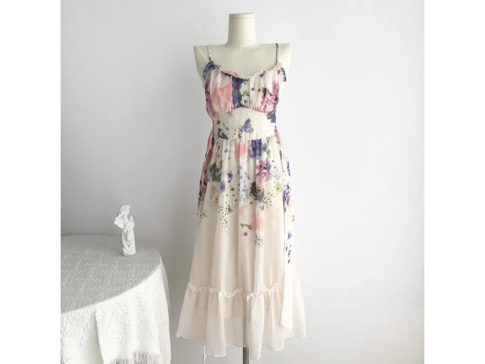 Floral midi slip dress on a mannequin