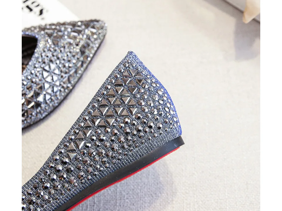 Close-up of the back of the rhinestone flat shoe.