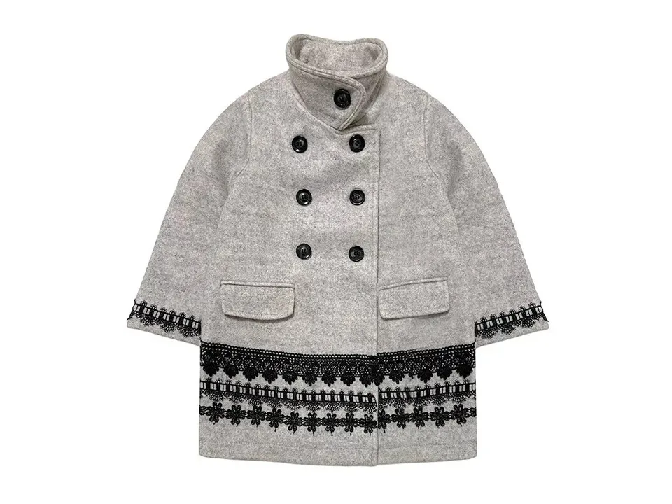 A grey wool coat for girls featuring black lace trim on the sleeves and hem.