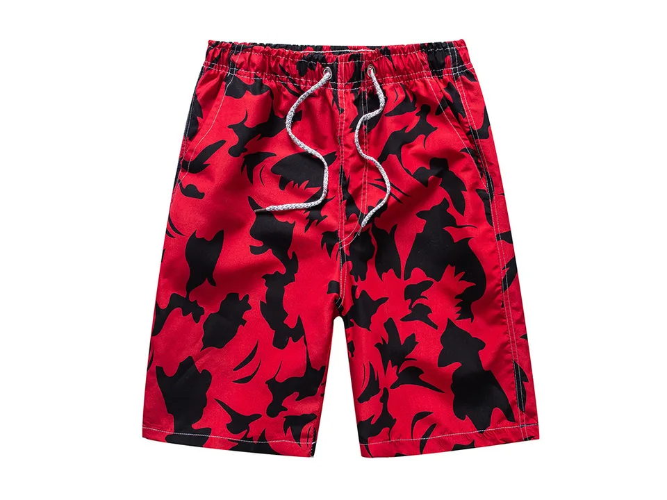 Men's board shorts with a red and black camouflage pattern.