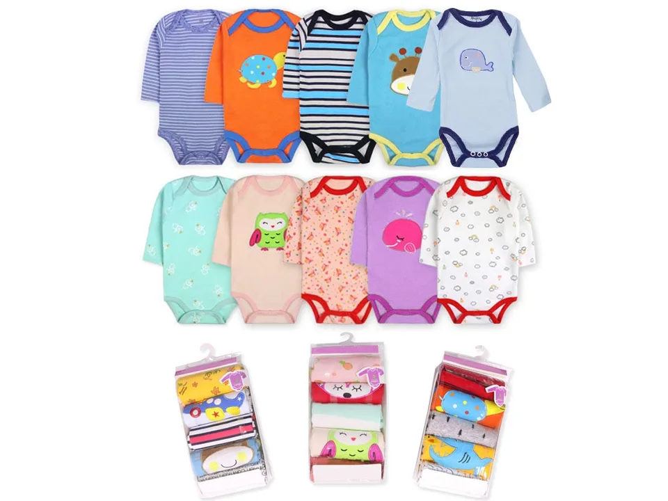 A collection of various baby rompers with different patterns and three sets in their clear plastic packaging.
