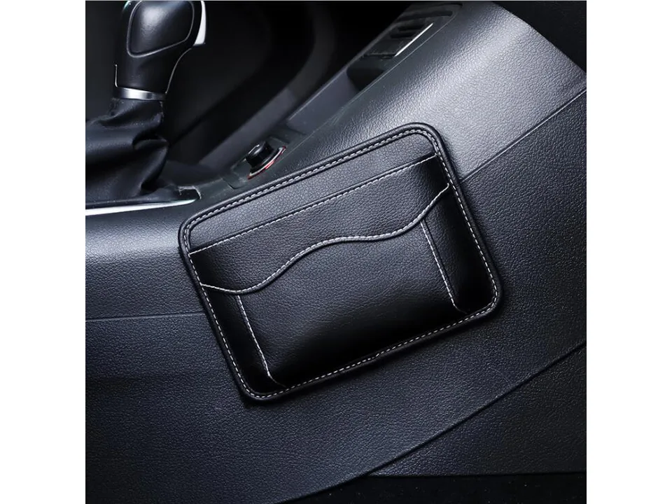 Black leather car organizer pocket installed on the side of a center console.