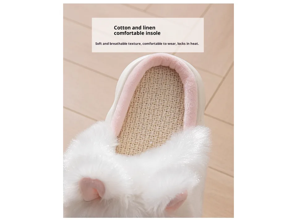 Close-up of the interior of a white fluffy slipper showing the cotton and linen insole.