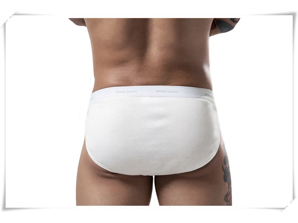 Back view of a man wearing white cotton briefs.