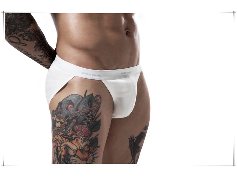 Close-up of the waistband and fit of white men's briefs.