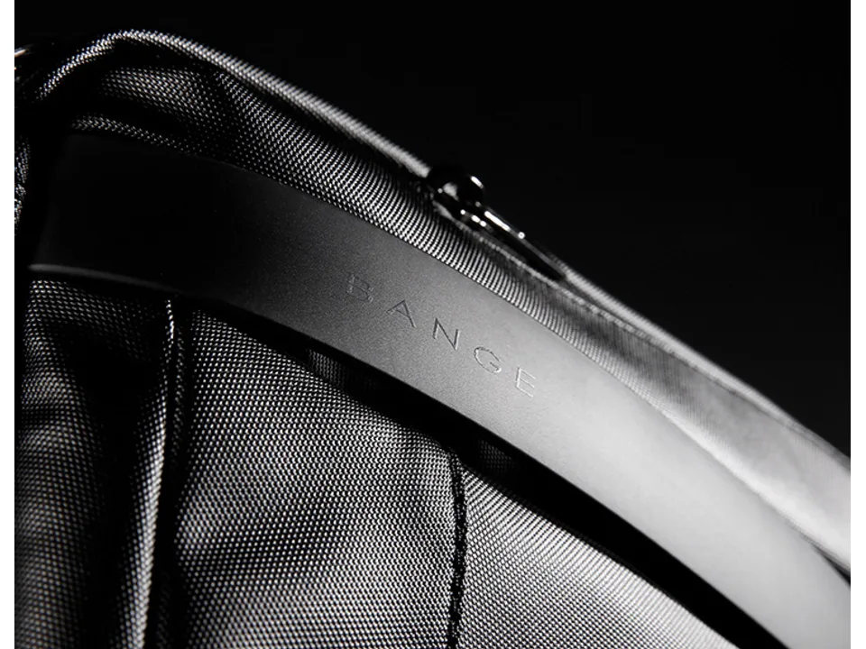 Close-up of the BANGE brand logo on the bag's front strap.