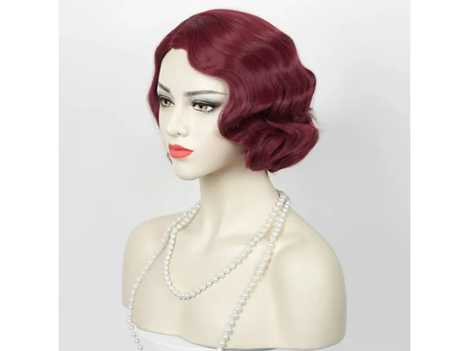 Dark red 1920s style flapper wig on a mannequin head.