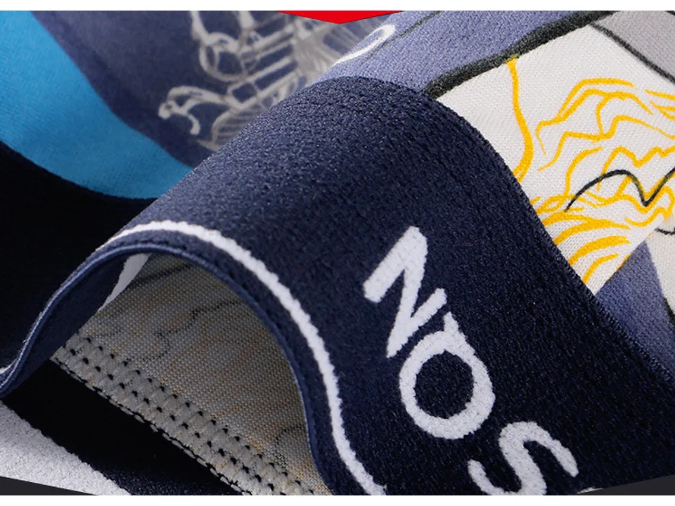 Close-up of the branded elastic waistband and fabric pattern.