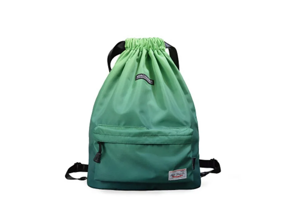 Green drawstring backpack with front pocket