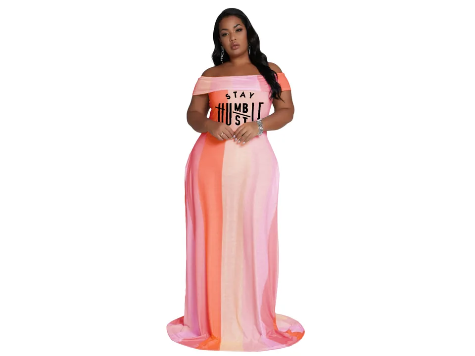 Model wearing the orange striped off-shoulder maxi dress with 'Stay Humble' graphic.