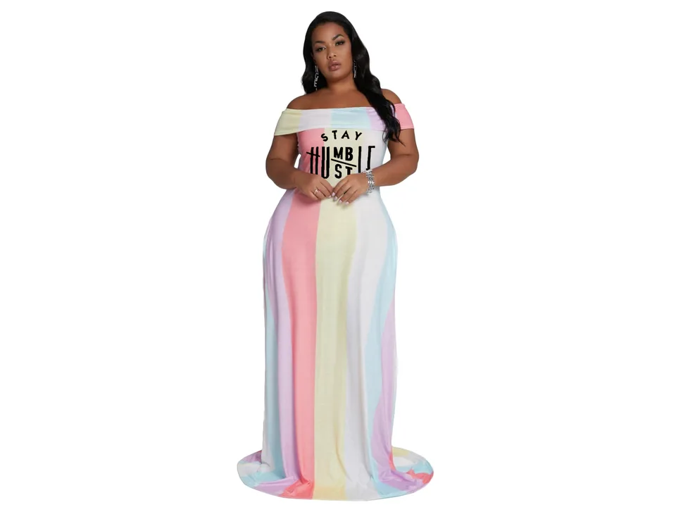 Model wearing the pastel striped off-shoulder maxi dress with 'Stay Humble' graphic.