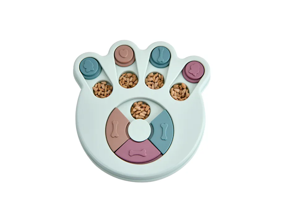 Paw-shaped dog puzzle feeder bowl with treat compartments.