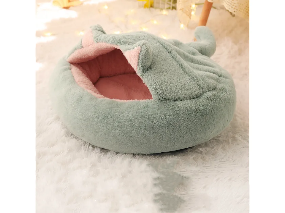 Sage green plush enclosed pet bed cave.