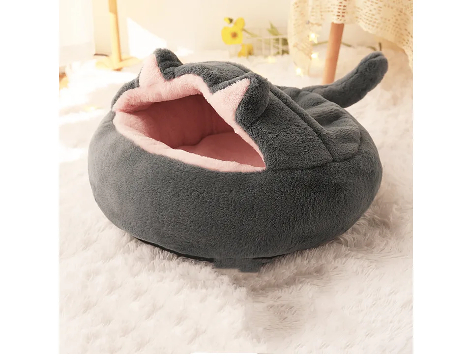 Grey plush enclosed pet bed cave with cat ear details.