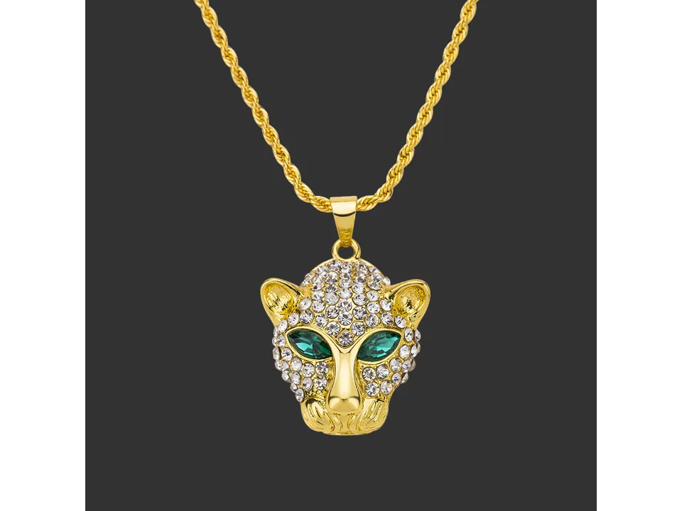 Gold leopard head pendant necklace with green eyes and crystal stones.