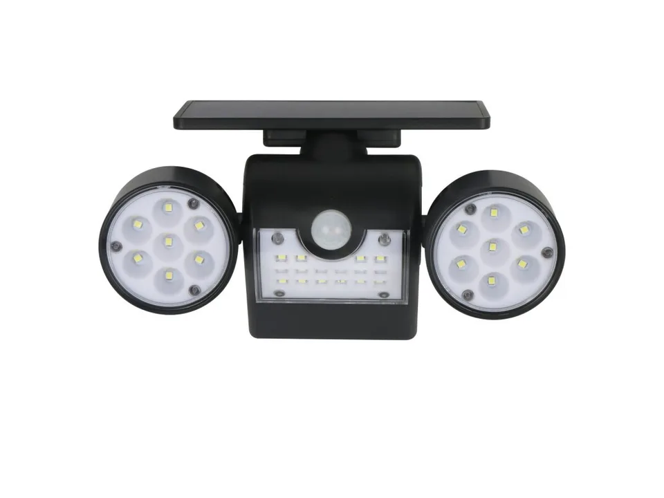 Solar garden light with dual heads and motion sensor on a white background.