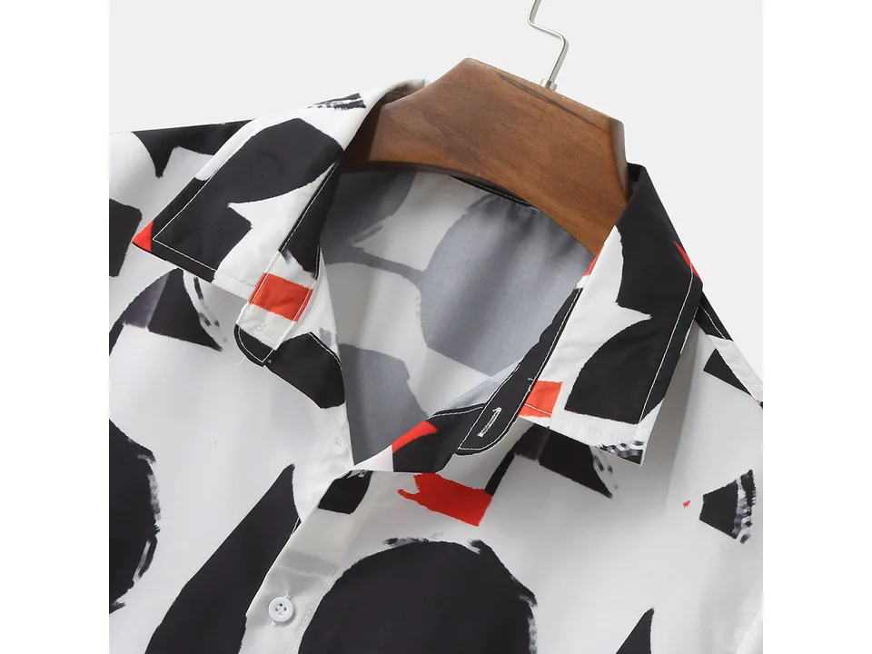 Close-up of the collar and button placket of the patterned shirt.