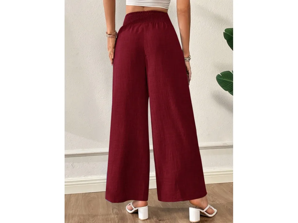 Back view of wide-leg pants in burgundy, showing the elastic waistband and fit.