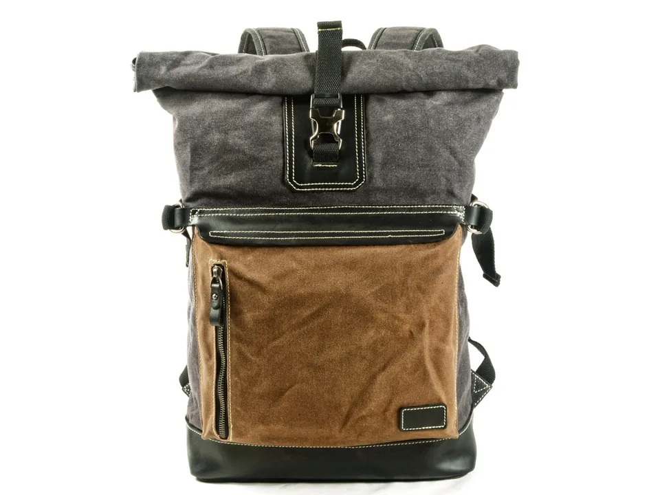 Front view of the grey and brown roll-top backpack with a front pocket.