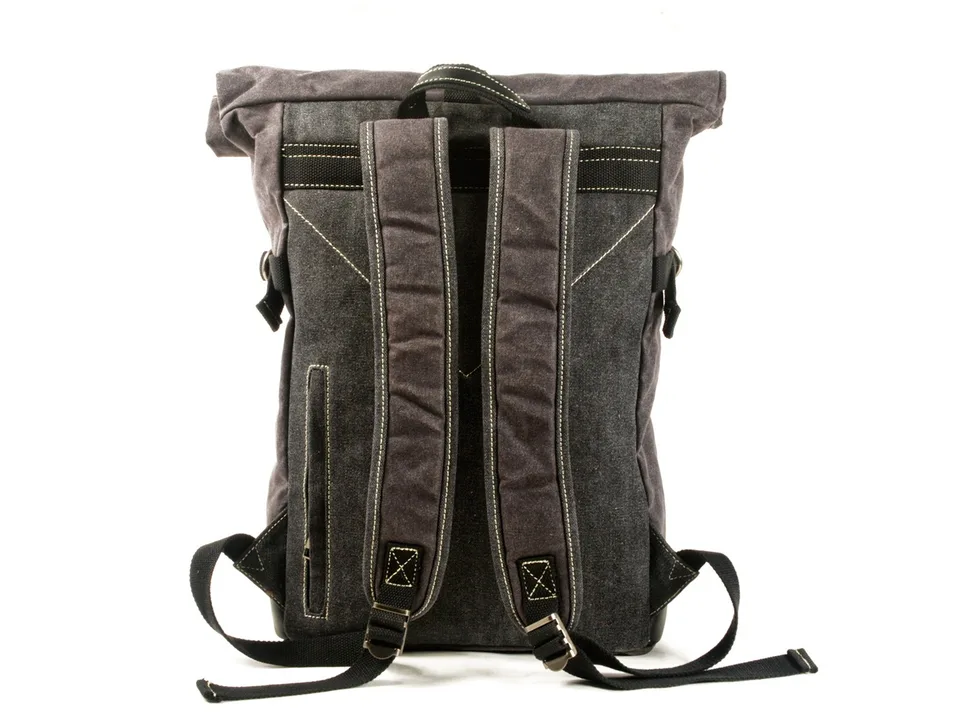 Back view of the grey and brown roll-top backpack showing shoulder straps and back padding.