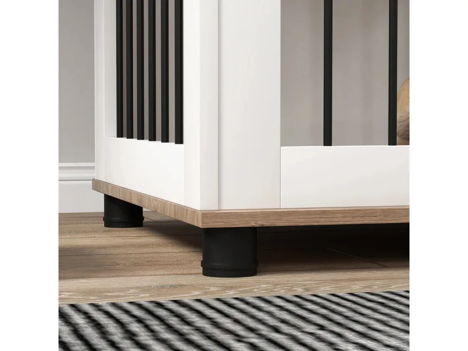 Close-up view of the dog crate's base, legs, and side panel.