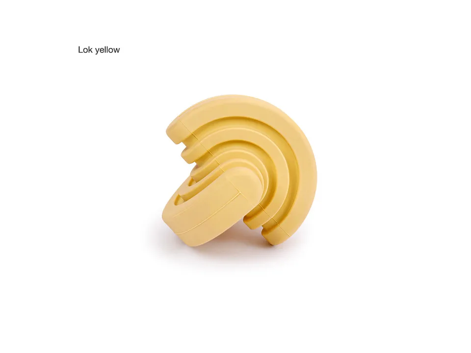 Yellow dog chew toy on a white background