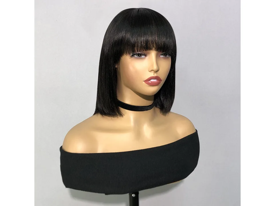 A straight black bob wig with bangs on a mannequin head.