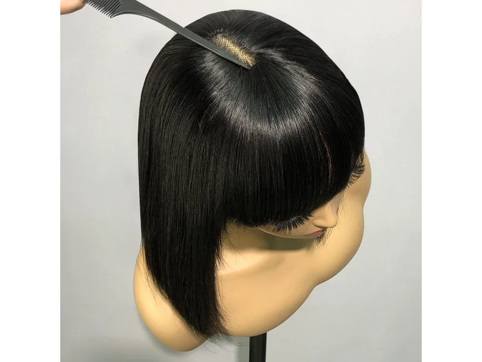 Top view of the wig on a mannequin showing the parting area.