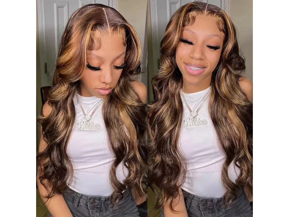 A woman wearing a long, wavy, brown and blonde highlighted lace front wig.