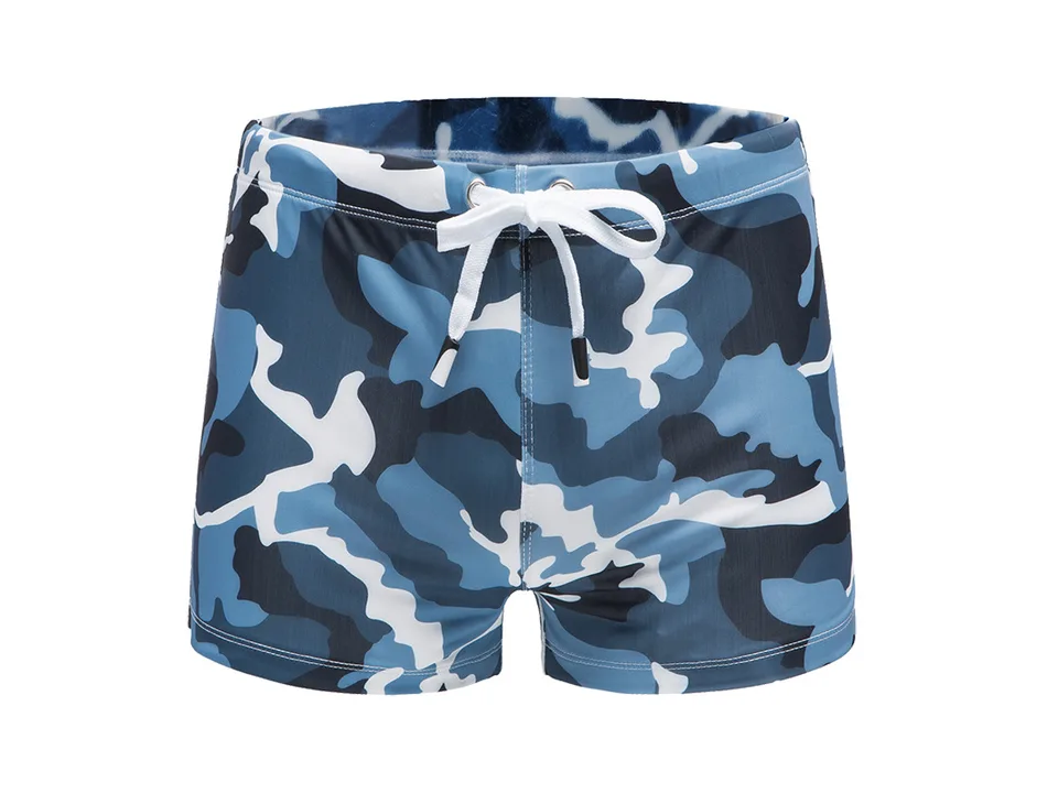 Blue camouflage swim trunks with a white drawstring.