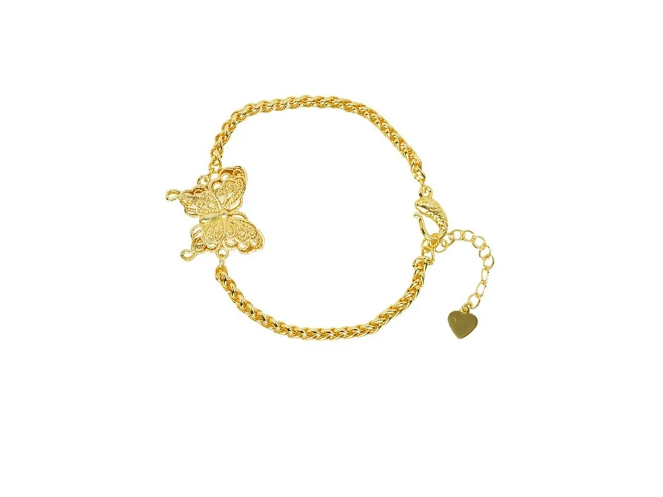 A gold-plated butterfly bracelet on a white background.