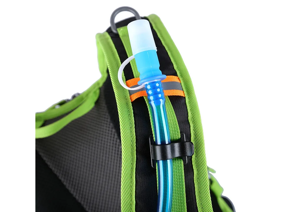 Close-up of a hydration tube nozzle attached to the backpack shoulder strap.