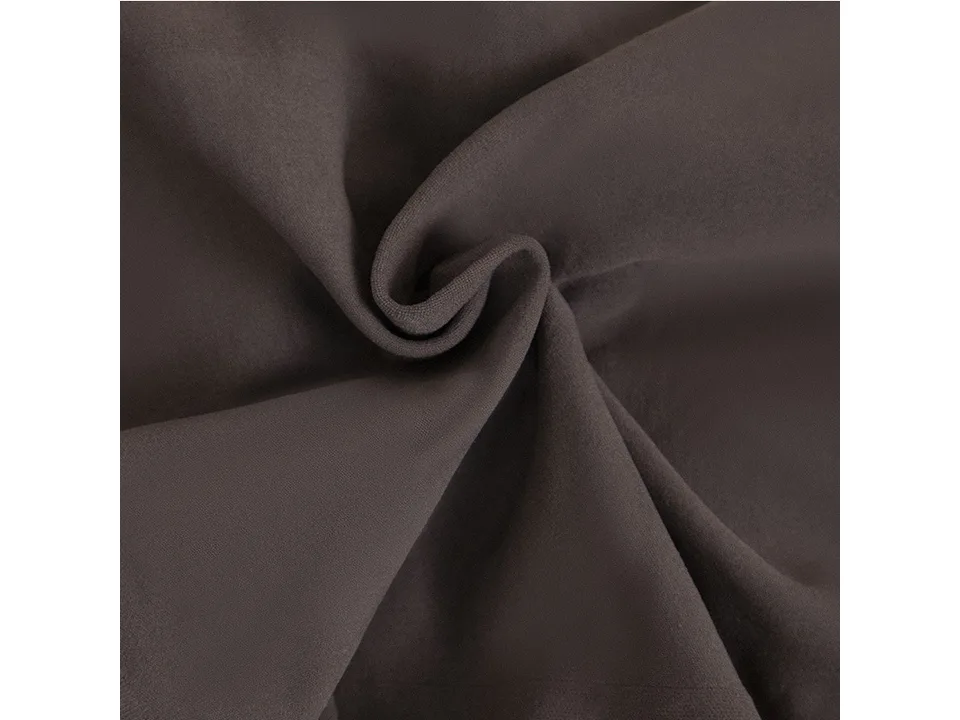 Close-up of the dark brown fabric texture of the shapewear.