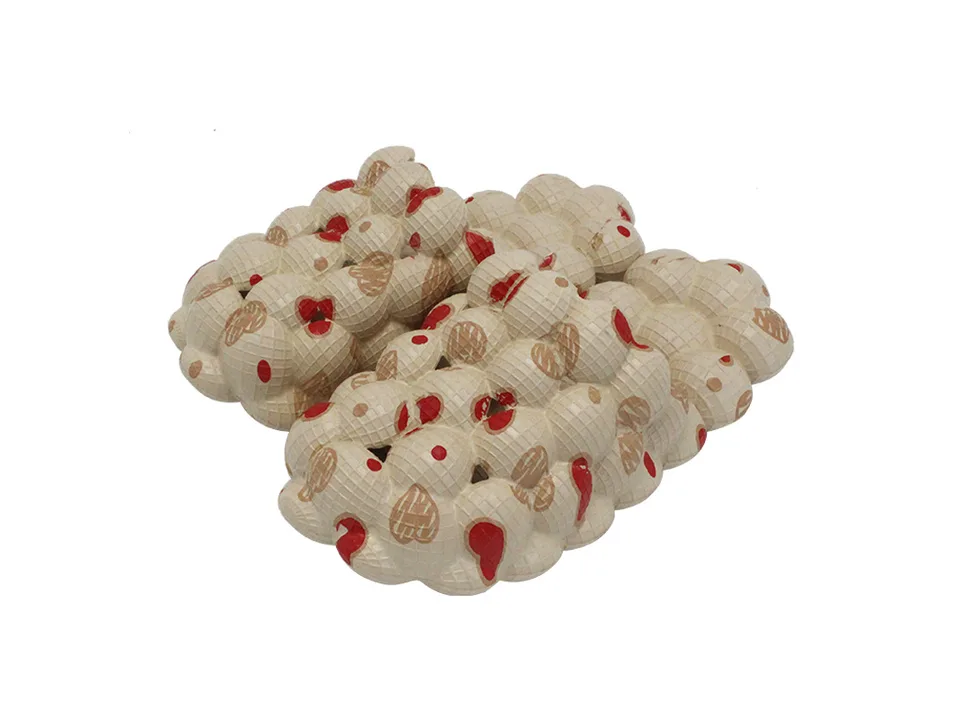 Beige bubble slides with red heart patterns.